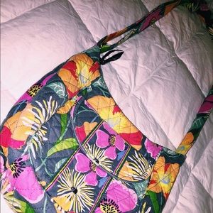 Vera Bradley floral, multi-colored cross body bag.